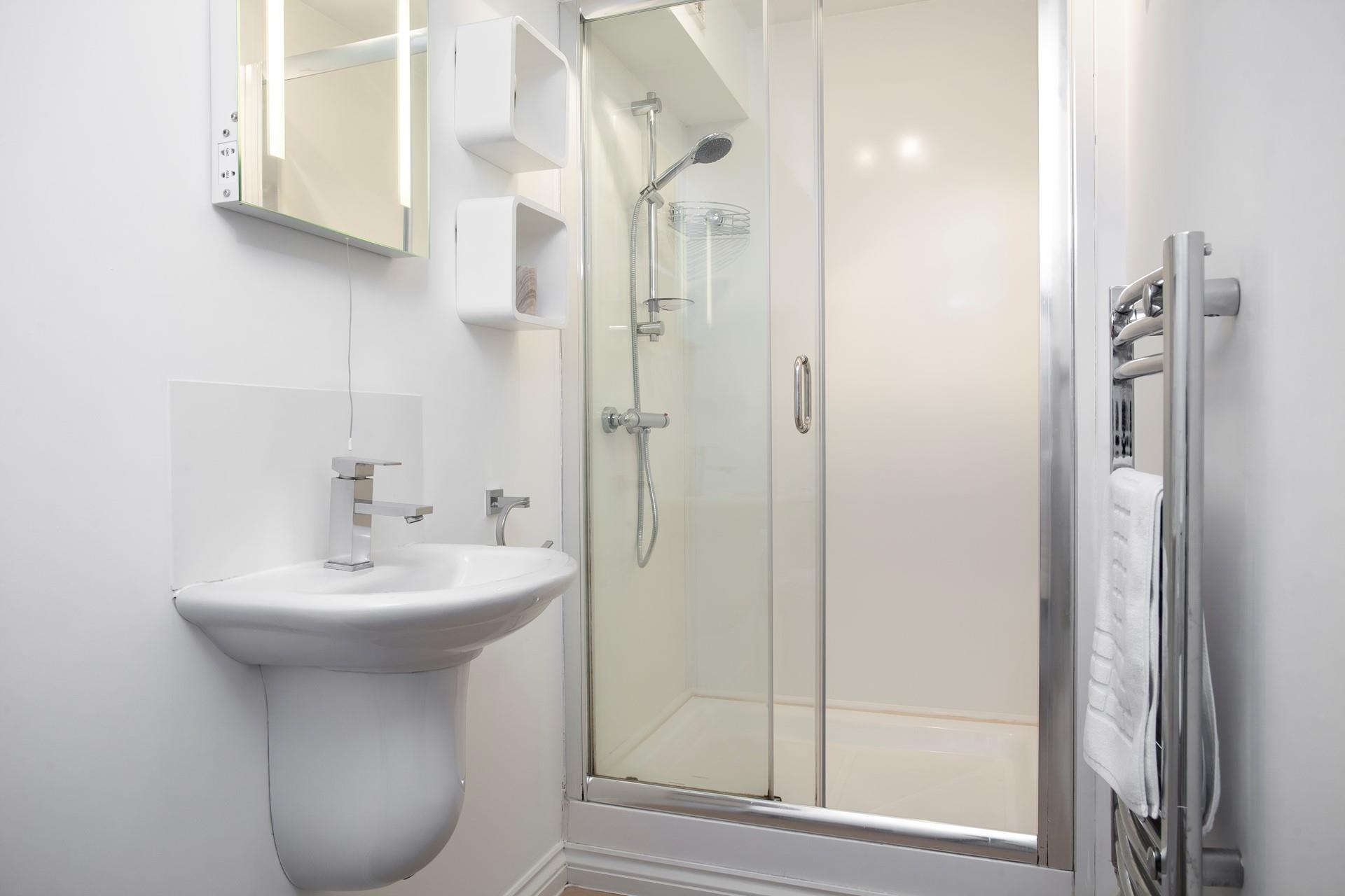 Get ready to head out for the evening in the bathroom.