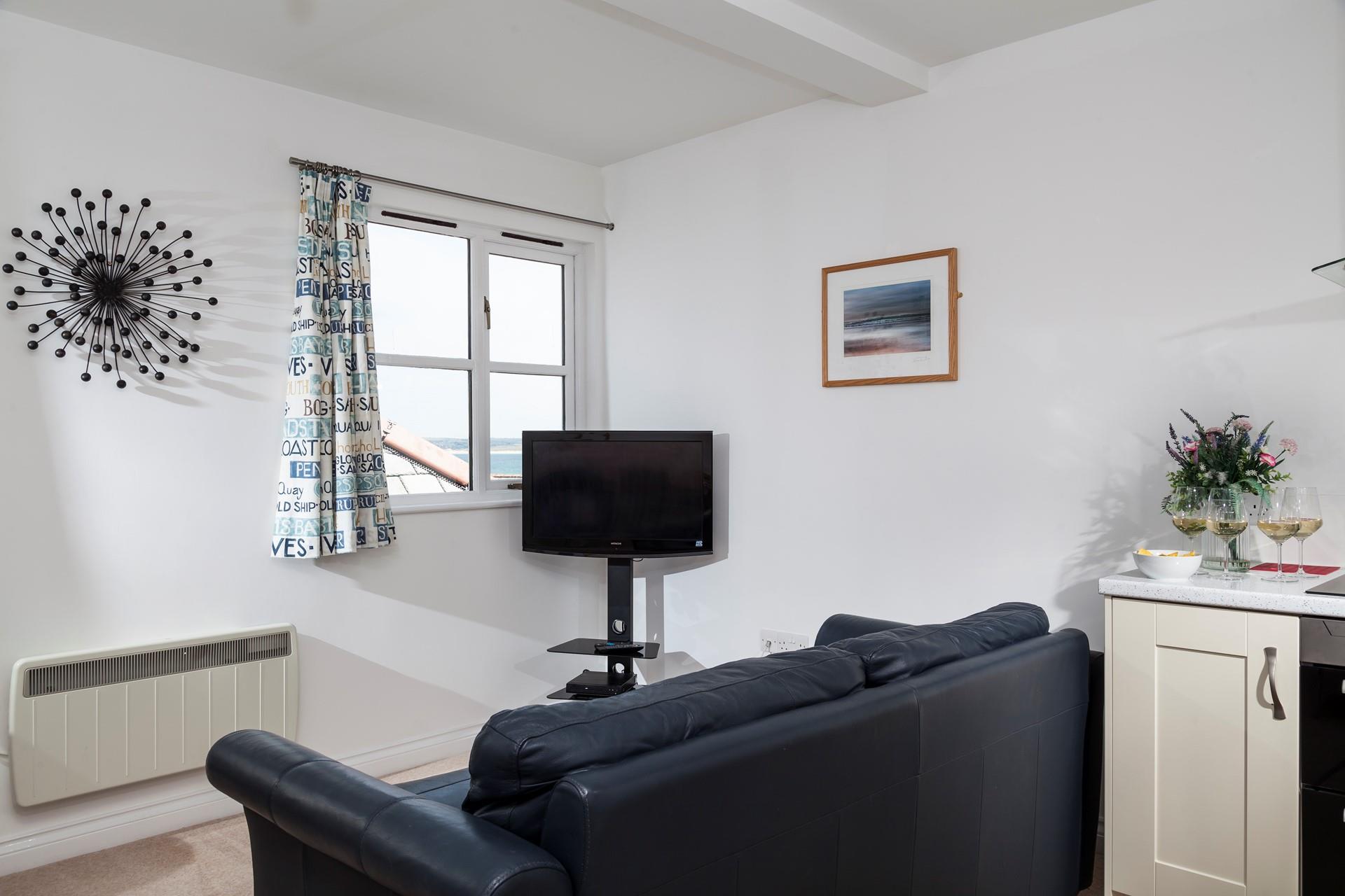 Gaze out at the sea view while you relax on the sofa with a cup of tea.