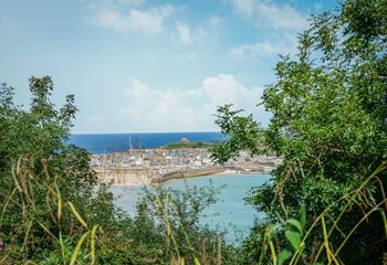 Try your hand at paddleboarding in the calm water of Porthminster beach.