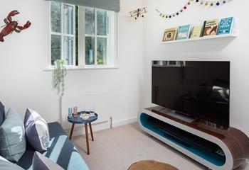 Relax on the balcony while the kids are entertained in the snug with the home cinema.