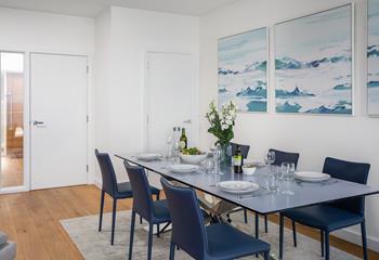 The stylish dining table seats 6 people; gather around to spend quality time together as a family.