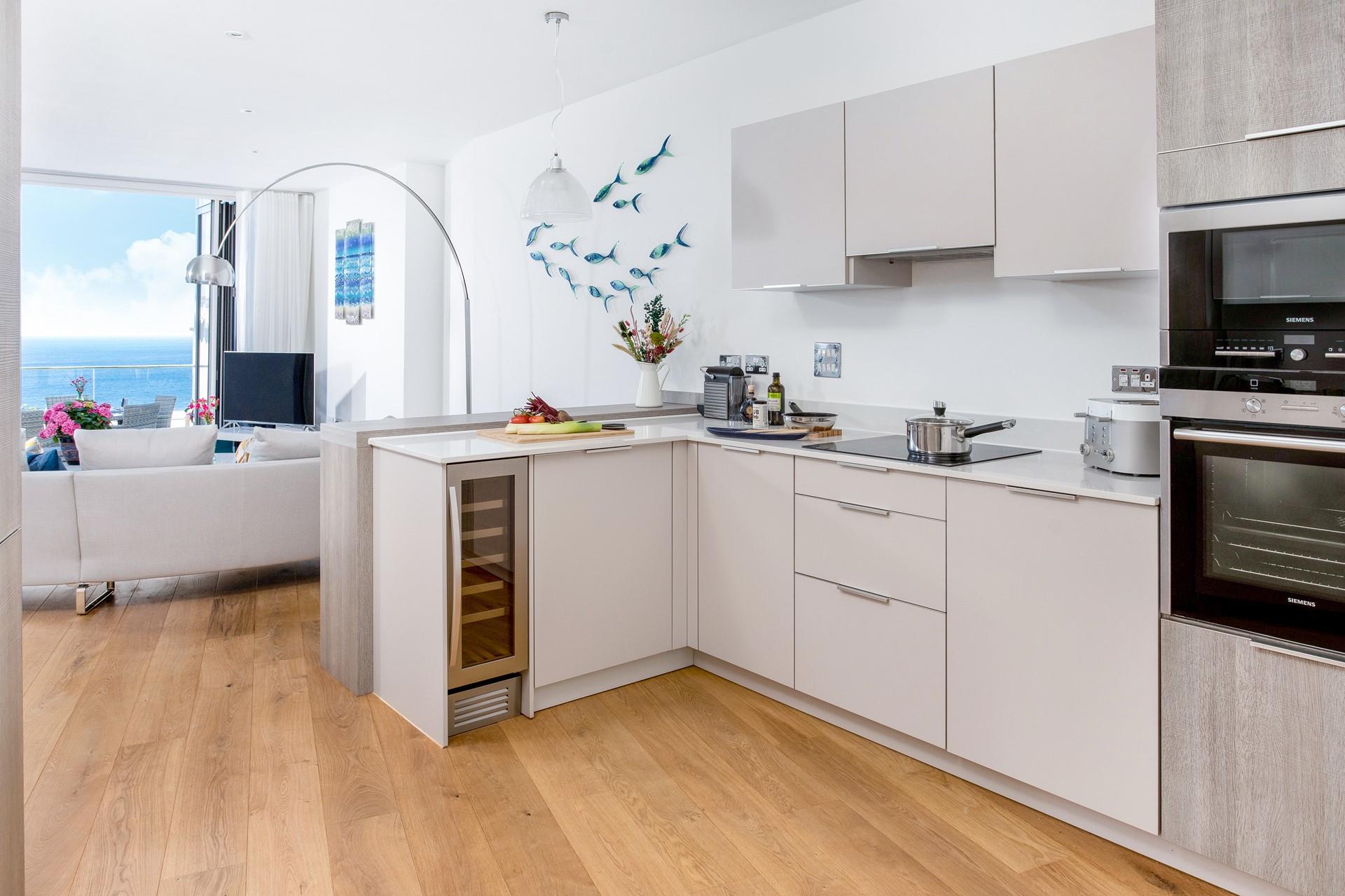 Make your first coffee of the day using the Nespresso machine and sip it on the balcony.