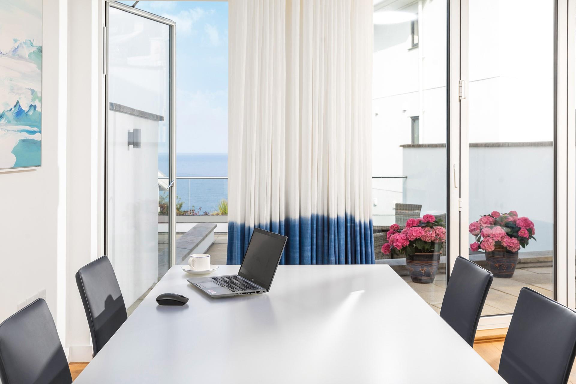 The perfect work from home spot listening to the waves in the distance.