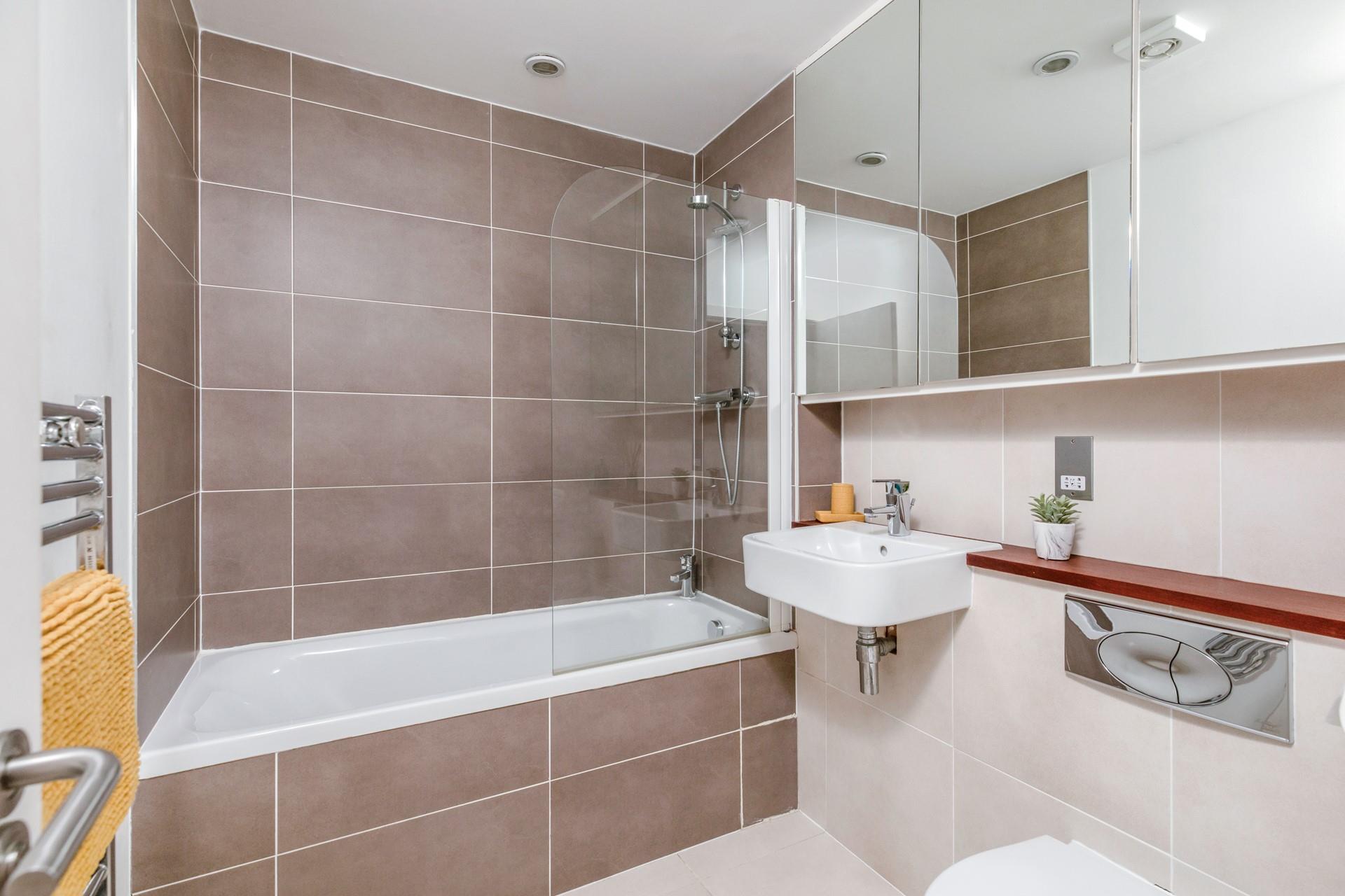 The family bathroom makes washing away beach days a breeze!