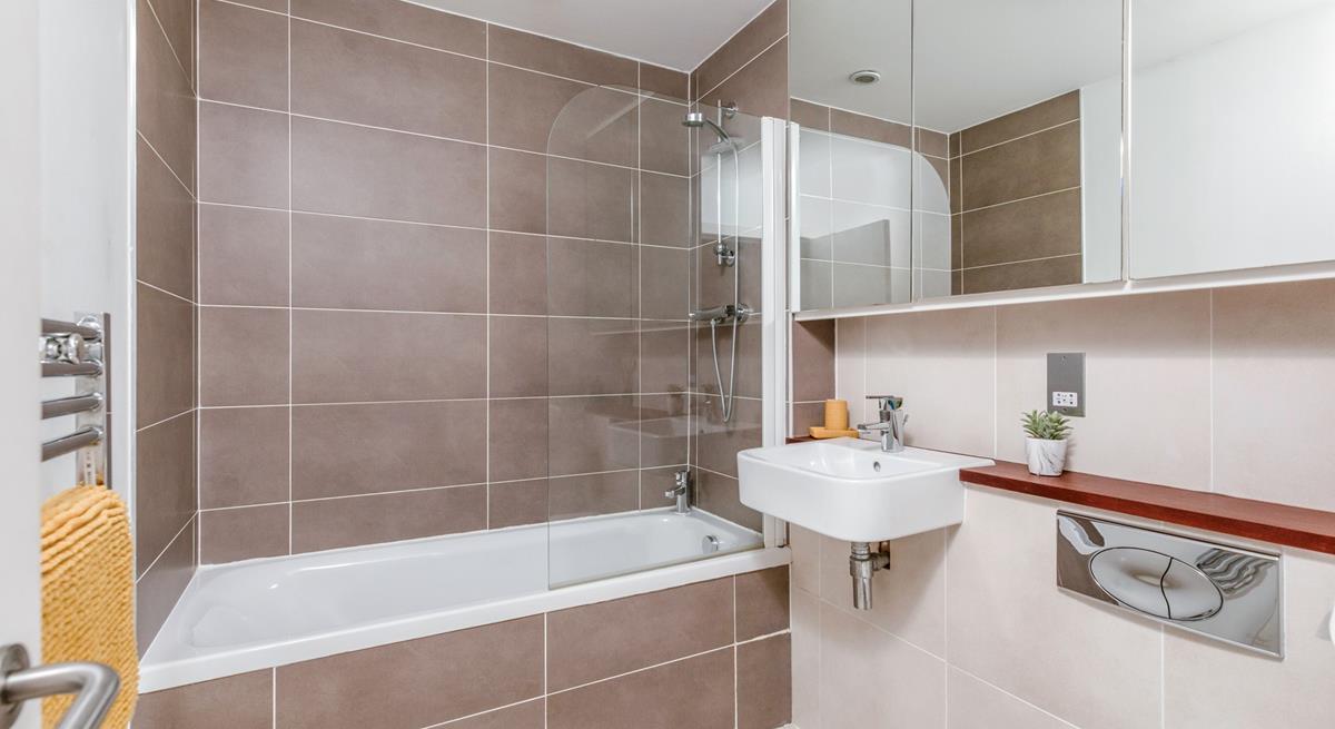 The family bathroom makes washing away beach days a breeze!