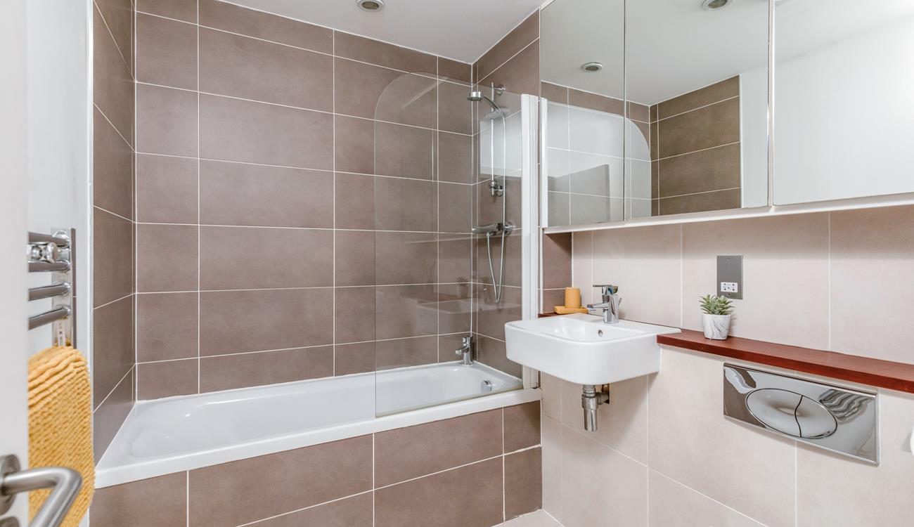 The family bathroom makes washing away beach days a breeze!