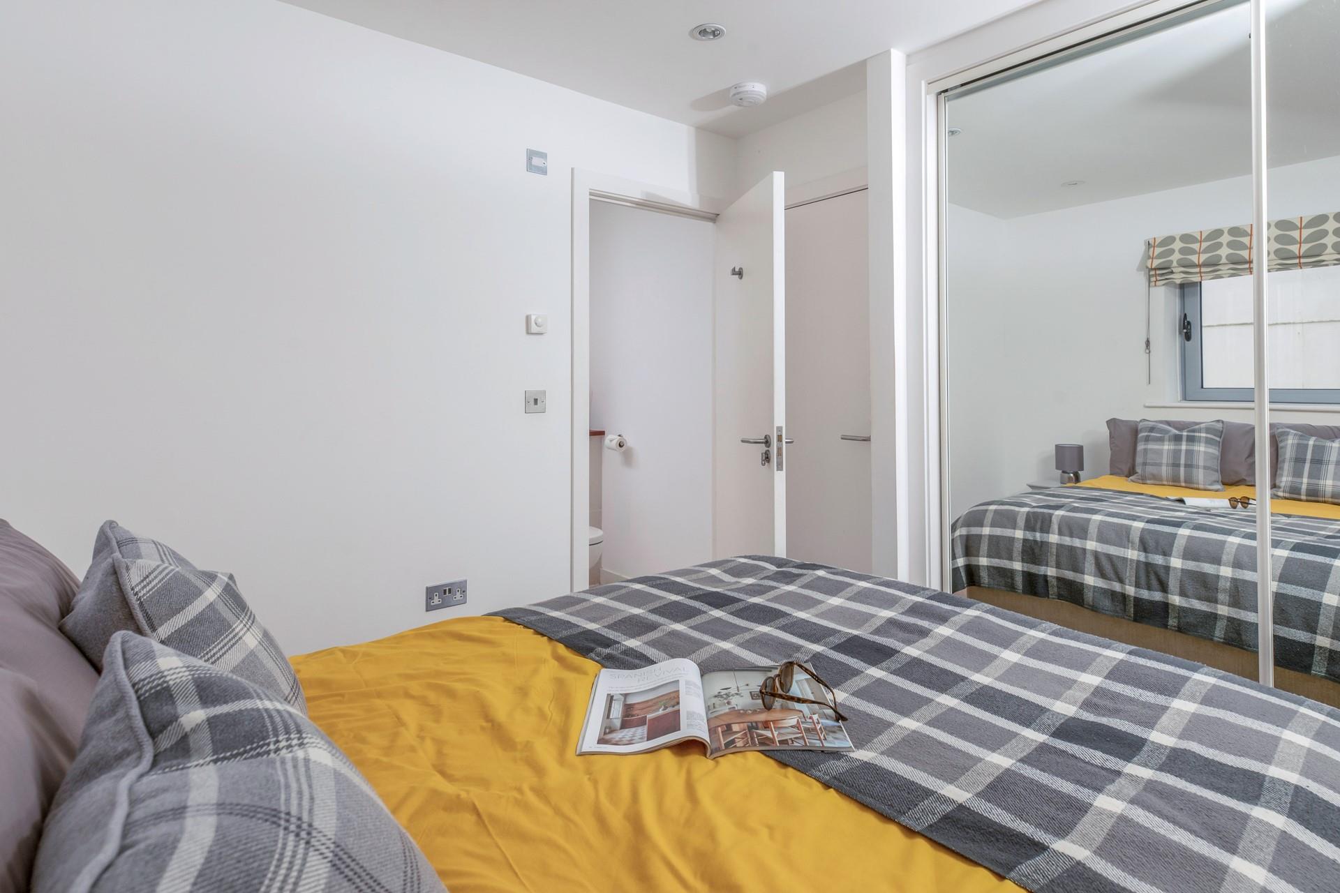The main bedroom has a modern en suite.