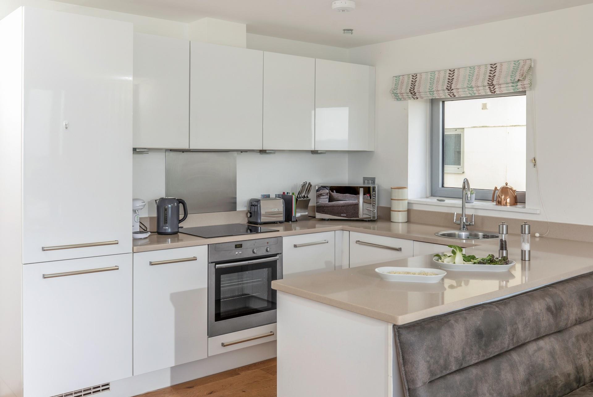 Cook up a storm in the well-equipped kitchen.