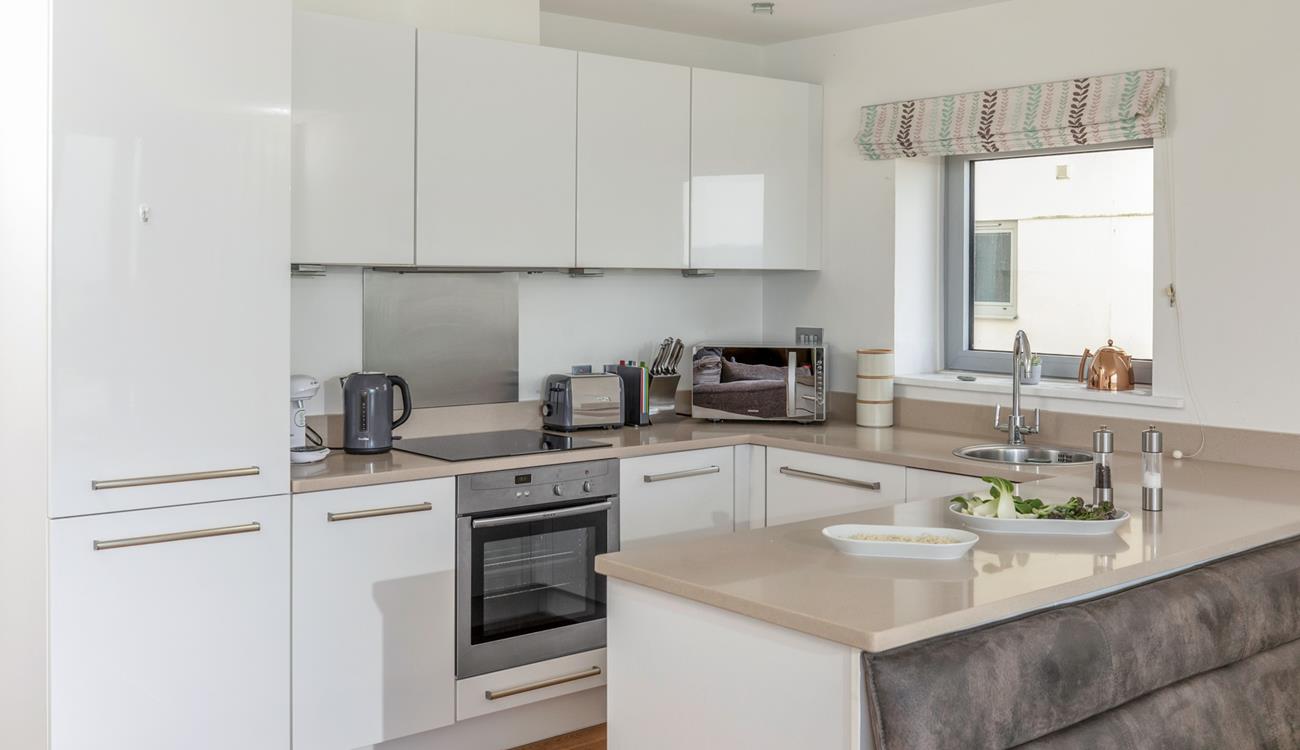 Cook up a storm in the well-equipped kitchen.