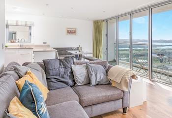 Enjoy the sea views from the sofa and dining table.