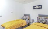 The delightful twin bedroom is perfect for adults or children. - Thumbnail Image