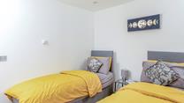 The delightful twin bedroom is perfect for adults or children.