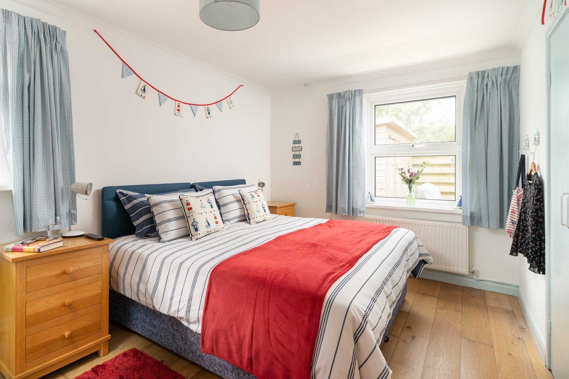 Savour slow mornings in the seaside-inspired bedroom.