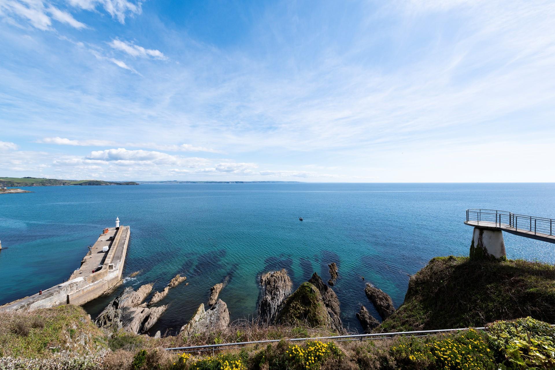 Wake early to watch the sunrise over the beautiful ocean.