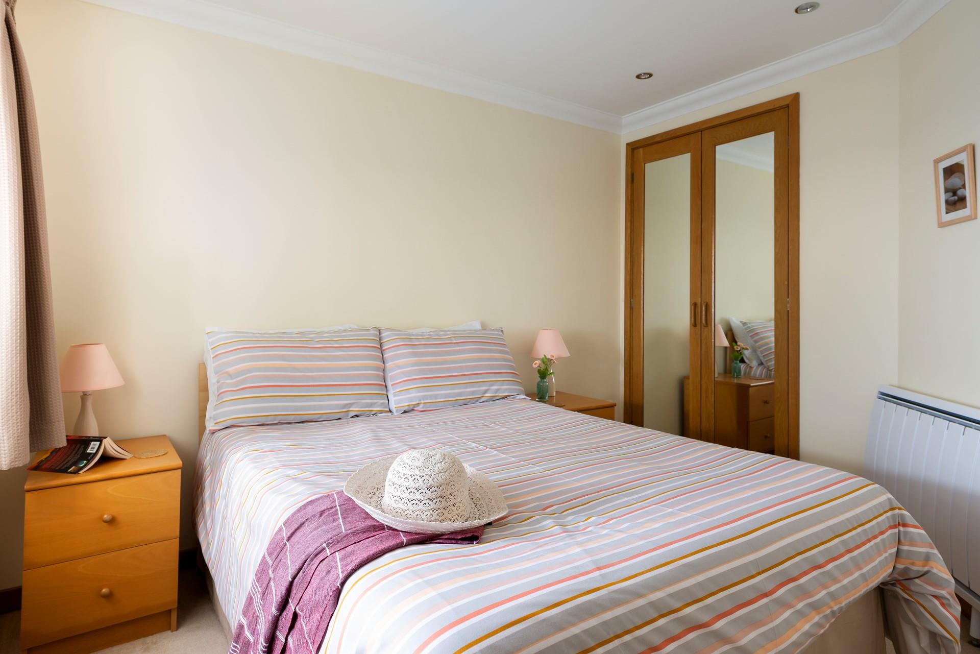 Bedroom 2 has a double bed to enjoy a blissful night's sleep.