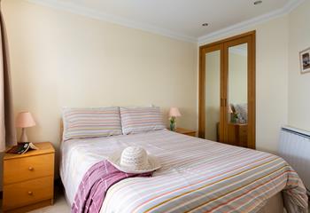 Bedroom 2 has a double bed to enjoy a blissful night's sleep.