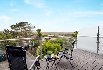 Relax on the balcony overlooking beautiful countryside views.