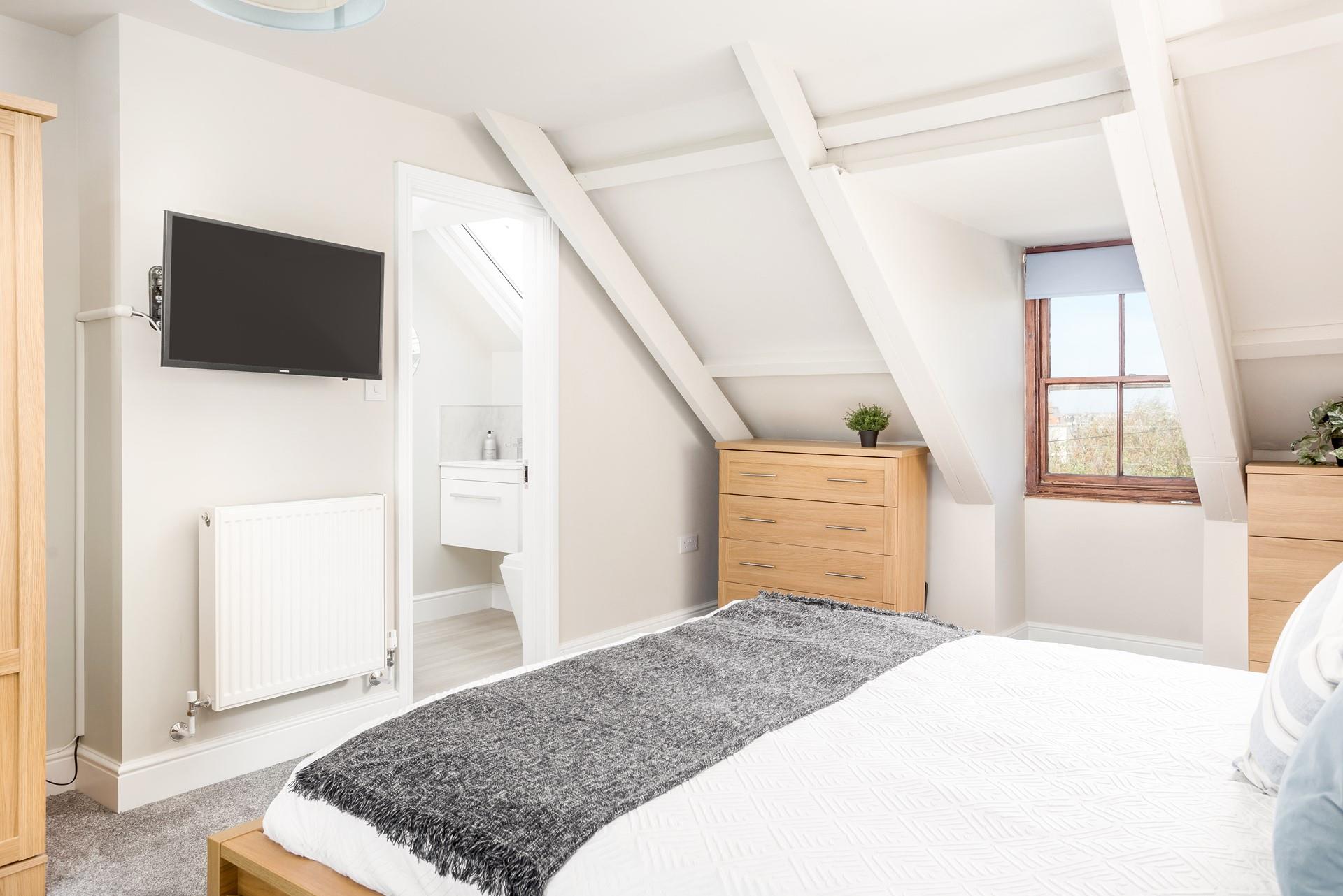 Wake up and wander into your en suite to get ready for the day.