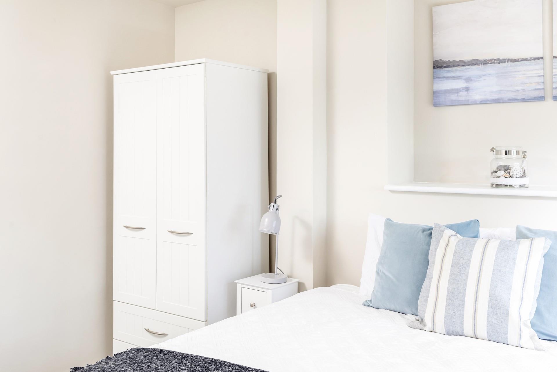 Unpack your holiday clothes in the wardrobe when you arrive.