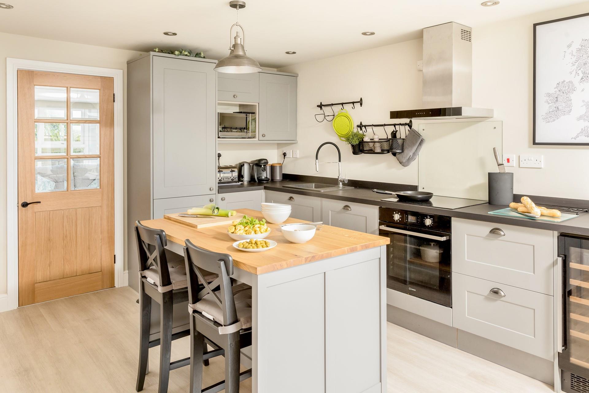 The modern beautifully presented kitchen is well-equipped for all your culinary needs.