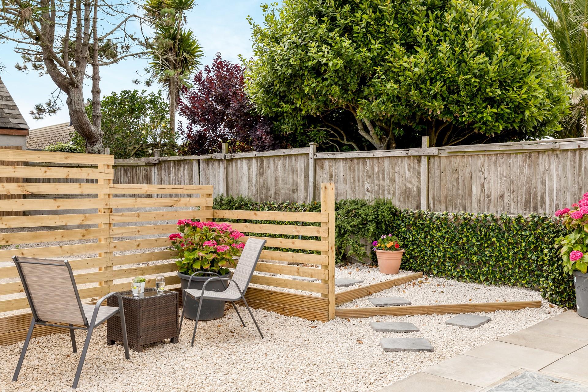 Watch the kids play in the garden while you sip a glass of your favourite tipple.