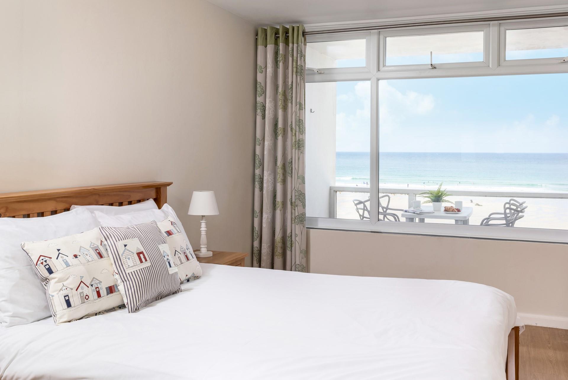 Go to sleep to the sound of the waves after spending the evening in town.