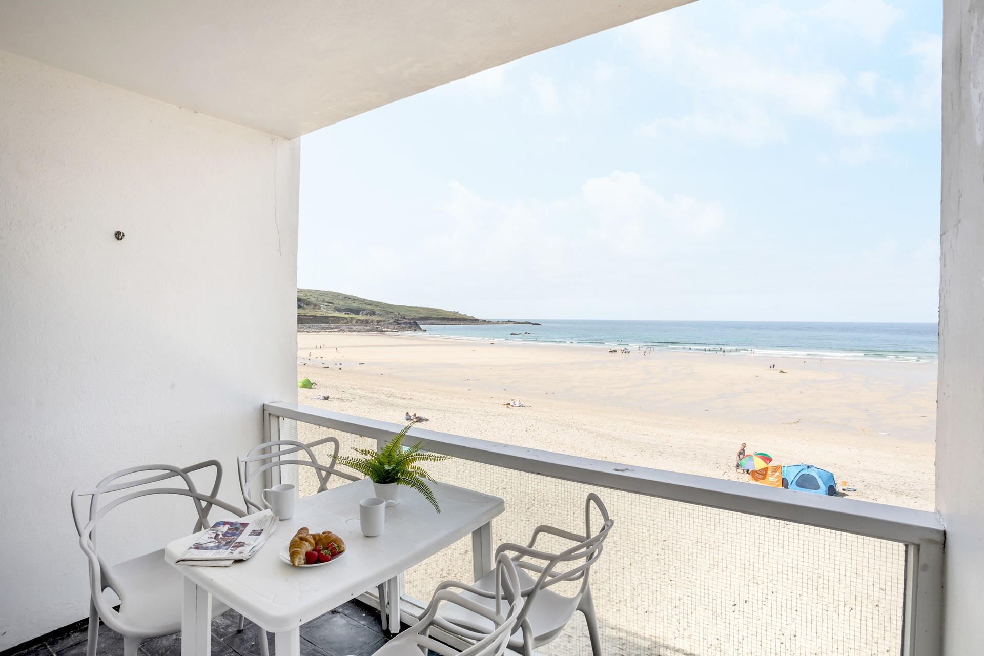 The balcony is the perfect breakfast spot.