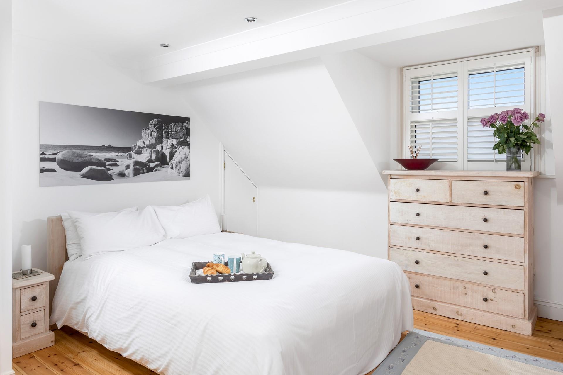 Tuck into the soft sheets and drift off for a peaceful night's sleep.