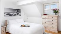 Tuck into the soft sheets and drift off for a peaceful night's sleep.