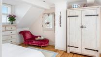 The chaise longue is the perfect spot for a cup of tea and to delve into a good book.