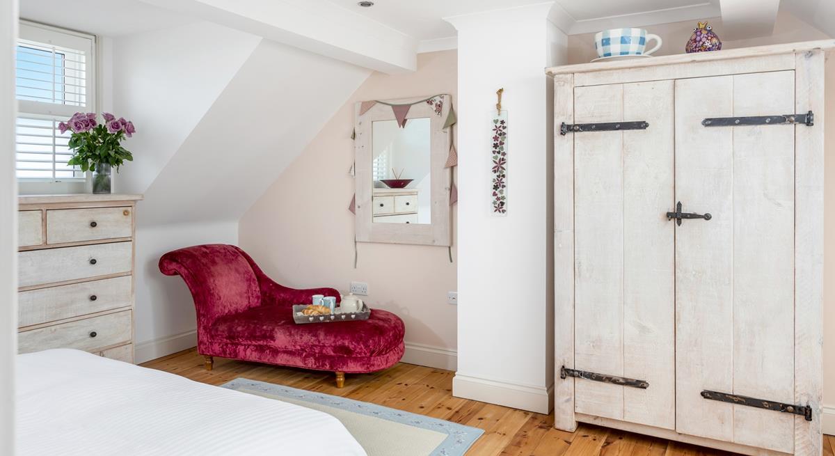 The chaise longue is the perfect spot for a cup of tea and to delve into a good book.