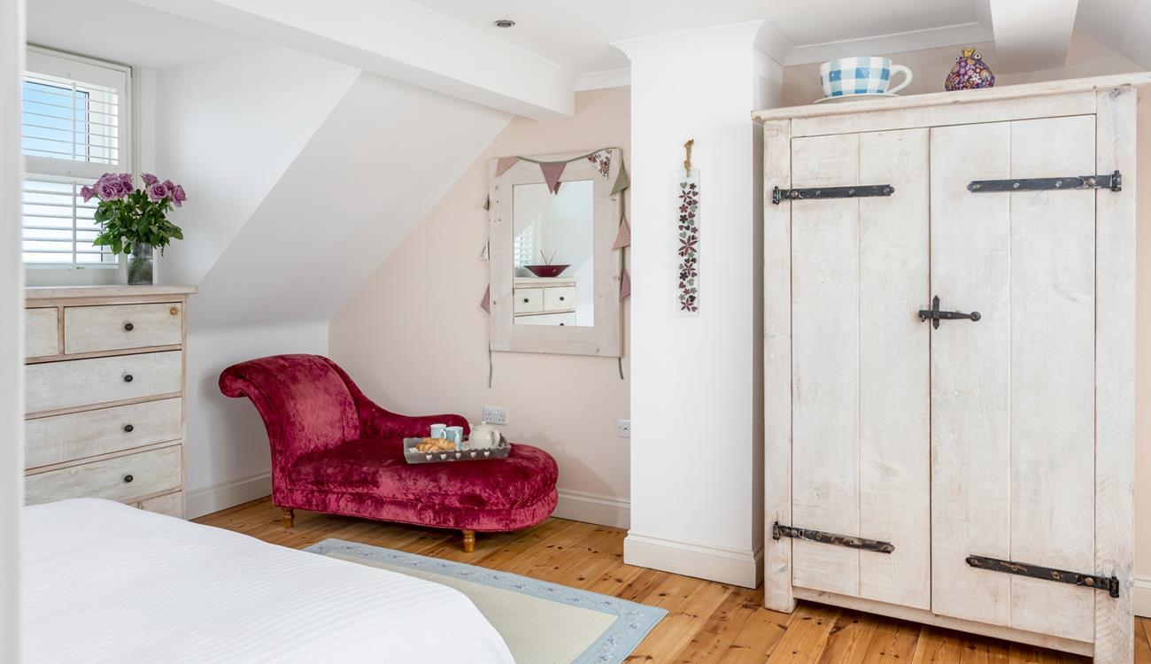 The chaise longue is the perfect spot for a cup of tea and to delve into a good book.