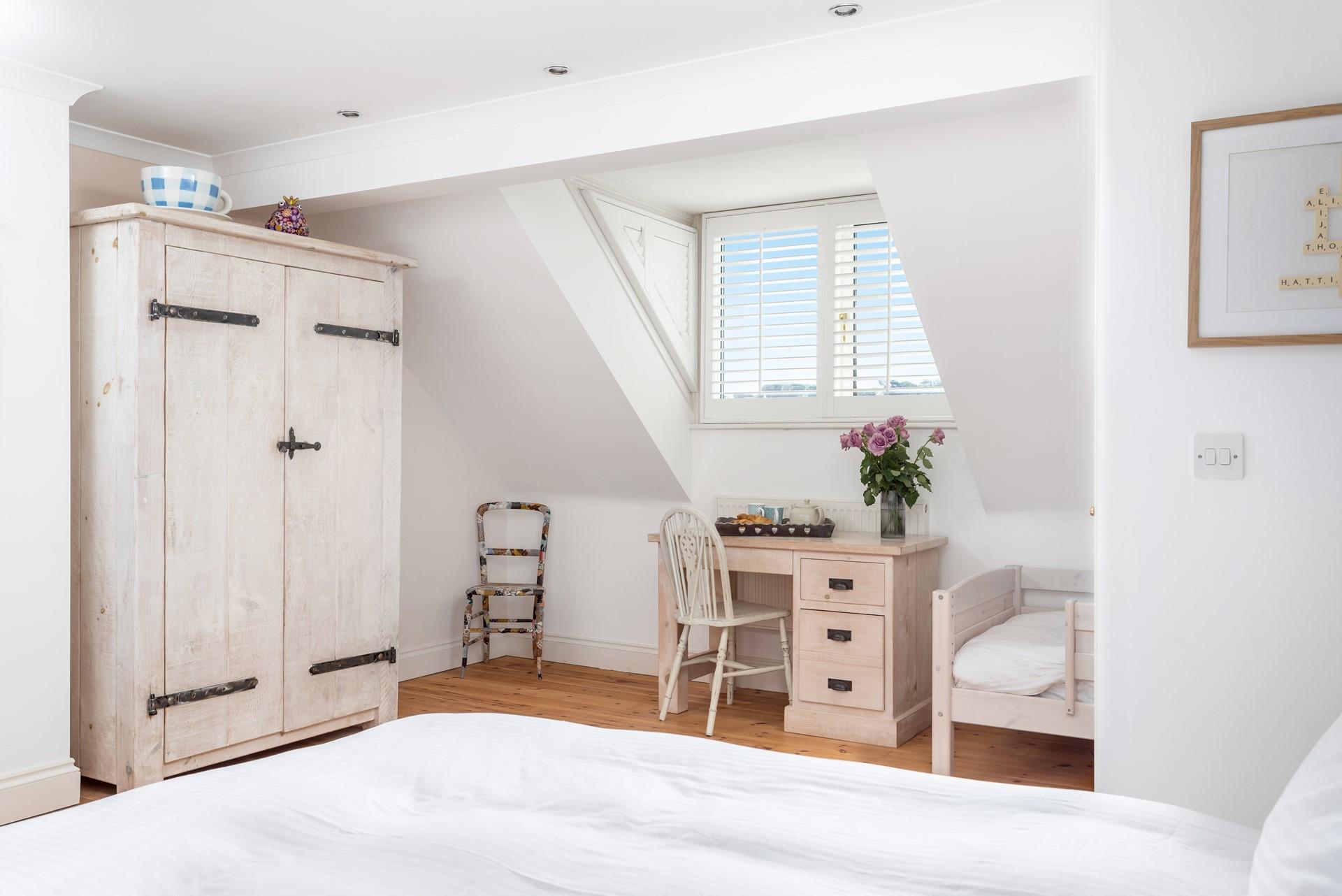 Bedroom 4 has ample furnishings so you don't have to pack light.