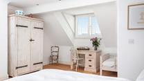 Bedroom 4 has ample furnishings so you don't have to pack light.