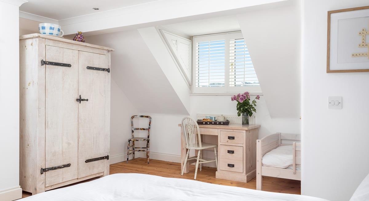 Bedroom 4 has ample furnishings so you don't have to pack light.