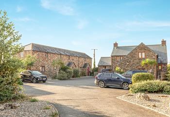 The approach to the courtyard of cottages tucked away down a lane but close to many amenities.