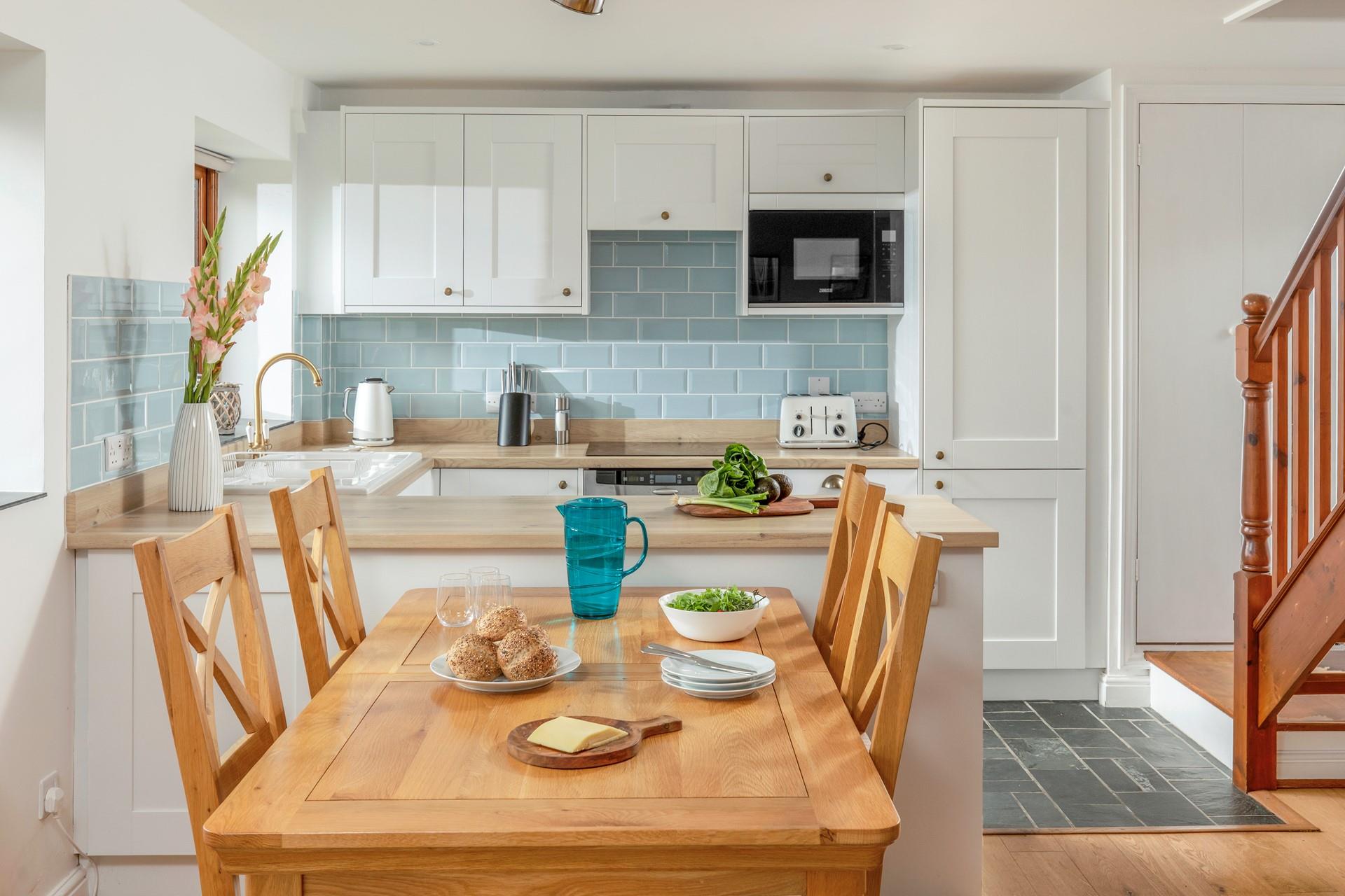 Make the most of dining together in the open plan kitchen area.