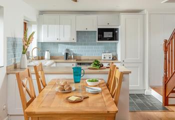 Make the most of dining together in the open plan kitchen area.