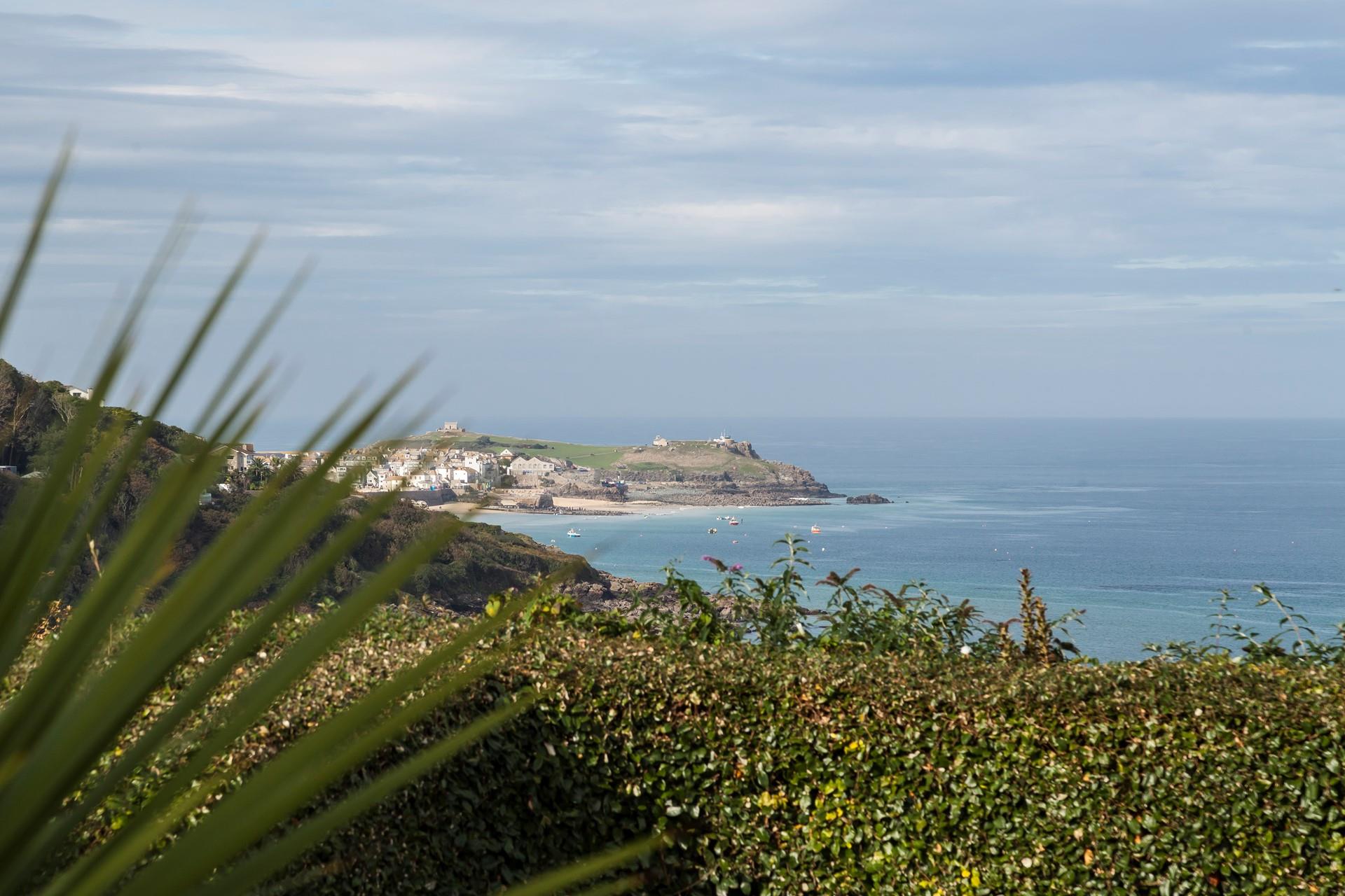 This cosy home also offers stunning views over to St Ives.