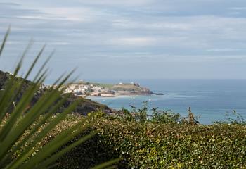 This cosy home also offers stunning views over to St Ives.