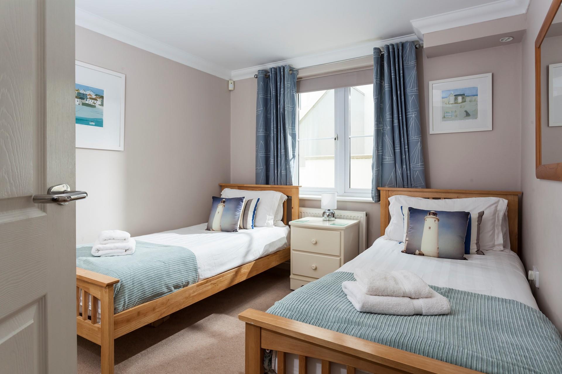 Fluffy towels await you after an invigorating shower to start the day.