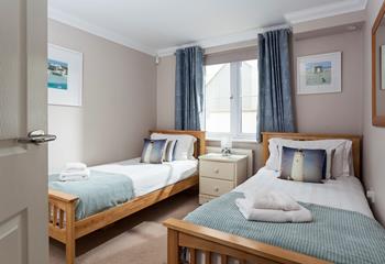 Fluffy towels await you after an invigorating shower to start the day.