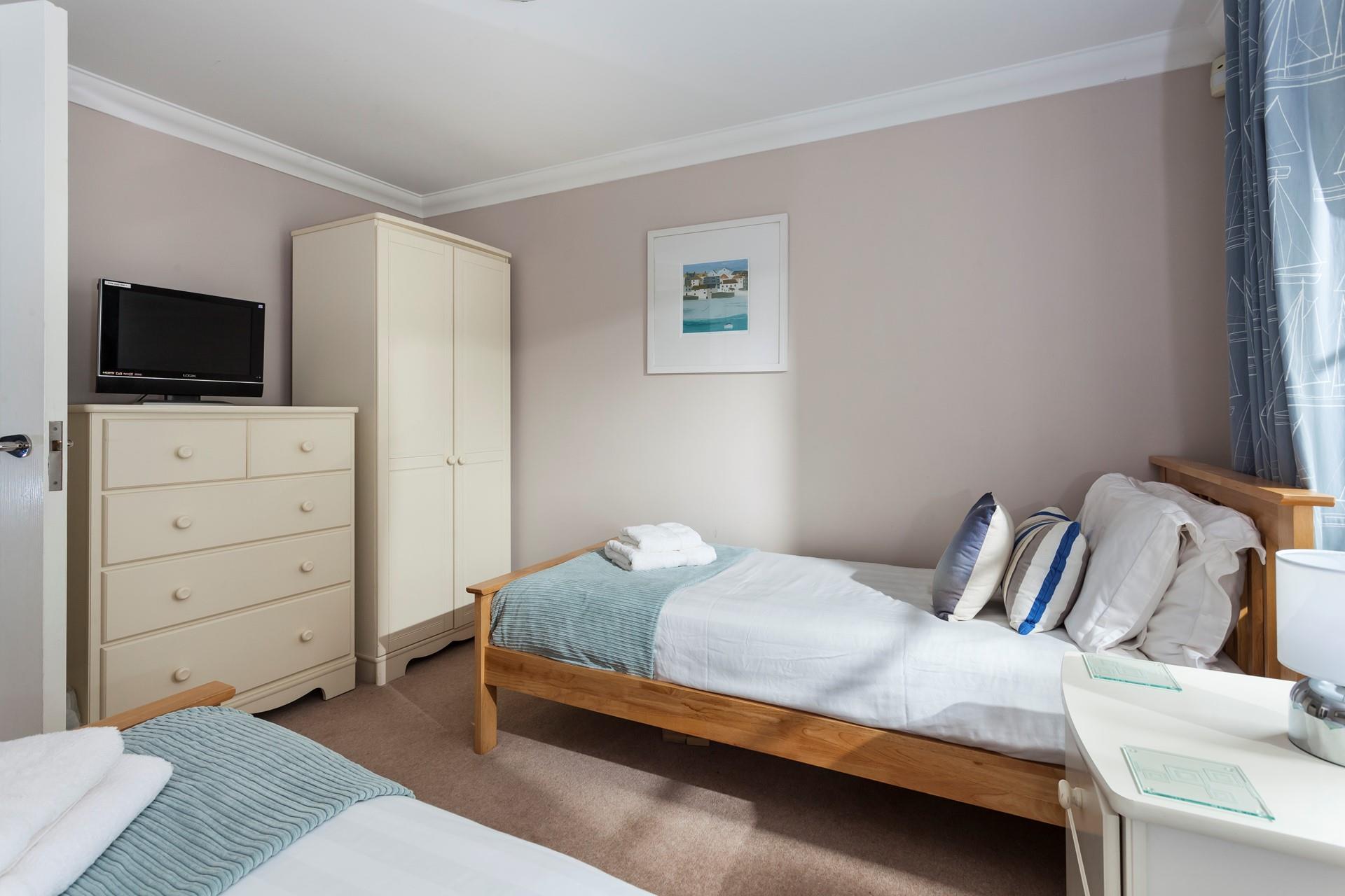 Twin beds are perfect for the kids to settle into after a busy day.