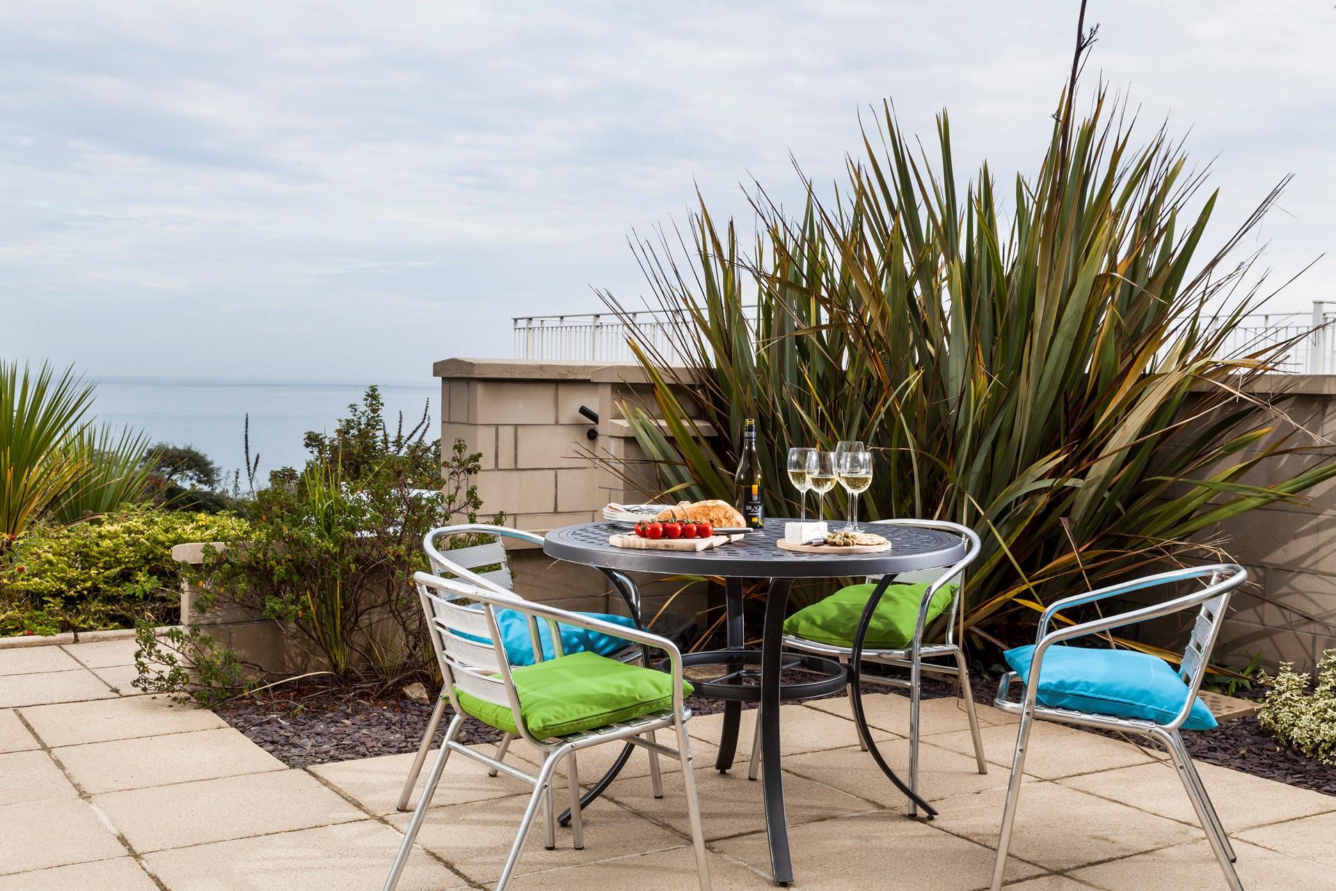 Gaze out at the stunning sea views whilst sipping your favourite tipple out on the patio.