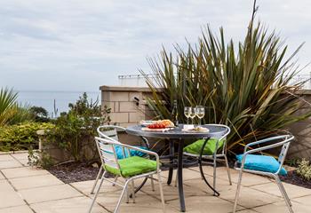 Gaze out at the stunning sea views whilst sipping your favourite tipple out on the patio.