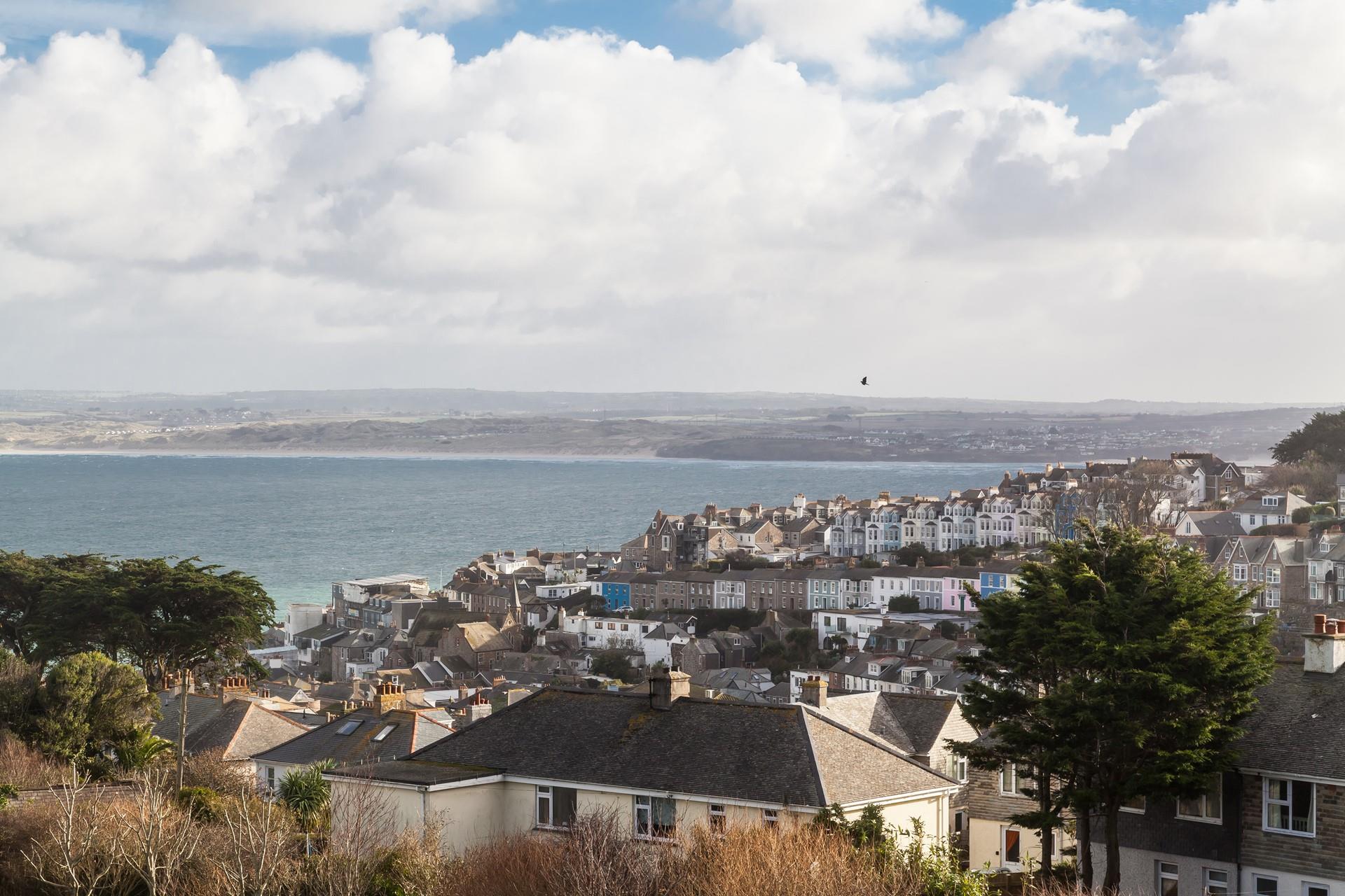 St Ives is filled with quirky rooftops stretching out to the sea.