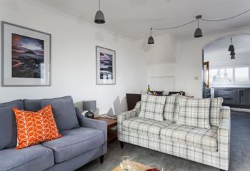 The cosy living space provides a space for the whole family to relax together.