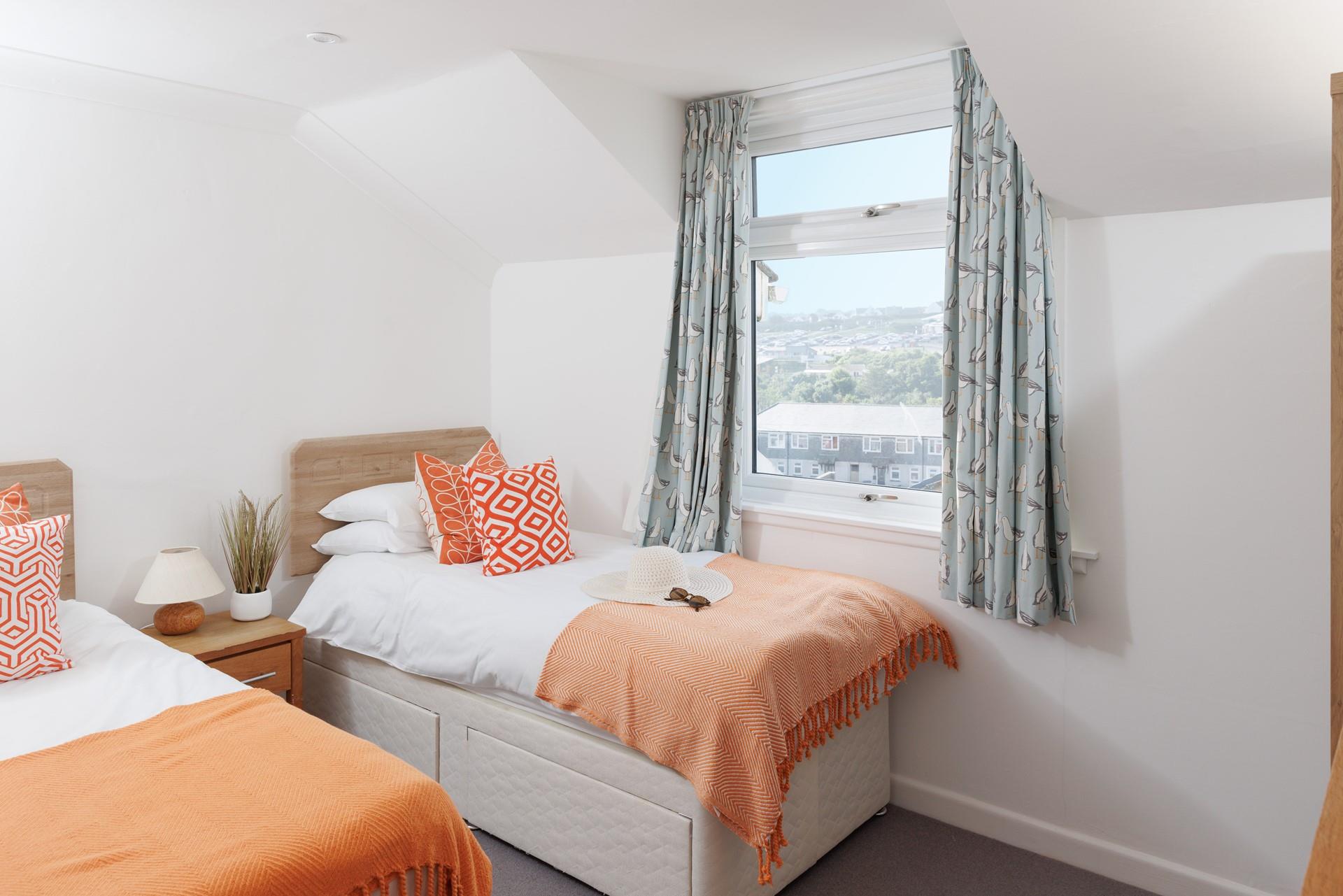 Drift into a dreamy night's sleep in the twin beds.