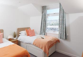 Drift into a dreamy night's sleep in the twin beds.