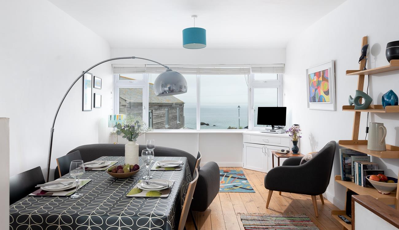 You can sit and watch the waves for hours in your cosy living area.